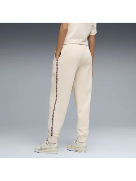 PUMA spodnie Essentials ze zwierzęcym nadrukiem Odzież Biały S beżowe
