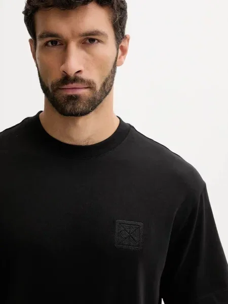 Tričko Calvin Klein s aplikací černá