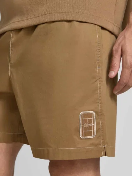 Szorty dresowe w kroju relaxed fit z czystej bawełny Lacoste