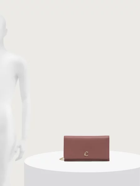 Кожаный клатч Coccinelle