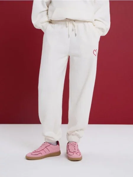 Джогери з флісу кремовий