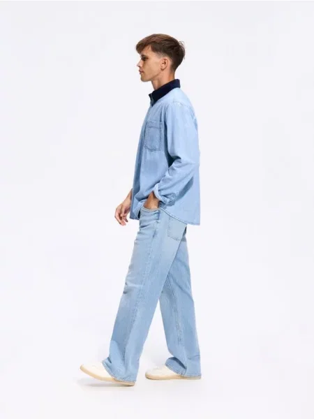 Reserved Blugi bootcut cu efect spălat albastru