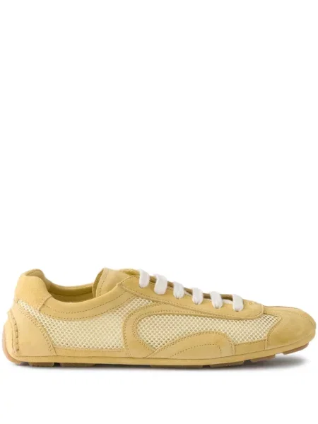 Sneakerși Prada din piele de căprioară galben