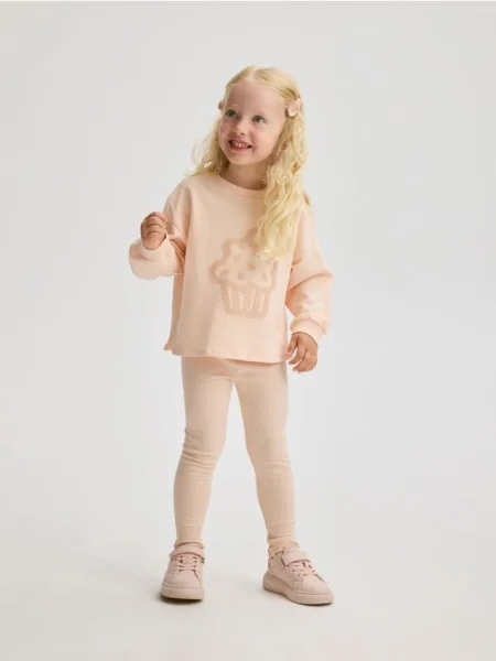 Reserved Prążkowane legginsy pastelowy róż