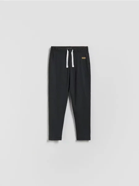 Леггинсы Reserved в рубчик серые