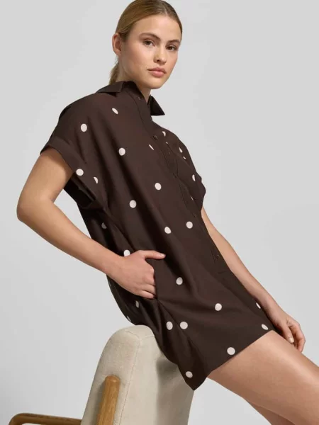 Luźny kombinezon z detalem w postaci guzików Style Icon Collection