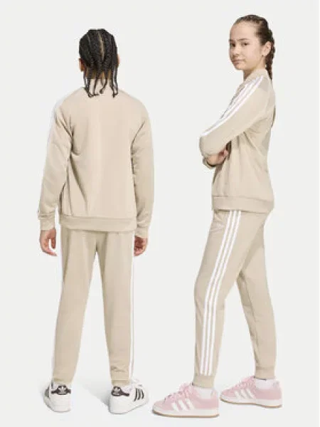 Teplákové kalhoty adidas béžové