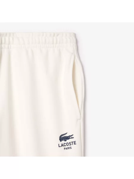 Зауженные спортивные штаны Lacoste голубые