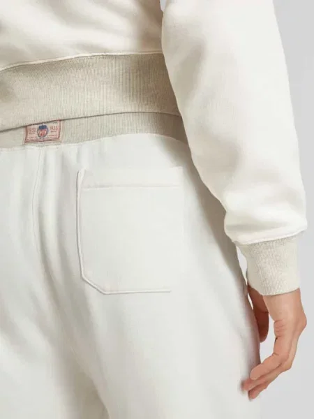 Spodnie dresowe o kroju regular fit z elastycznym pasem model ‘ATHLETIC’ Polo Ralph Lauren