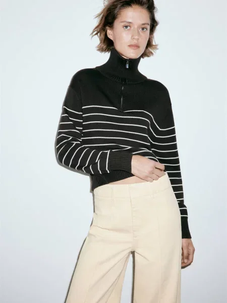 Jeansy wide leg z wysokim stanem i przeszyciami waniliowy Kobieta 50 MANGO