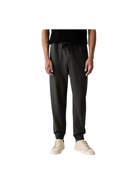 Spodnie dresowe Armani Exchange z nadrukiem zielone