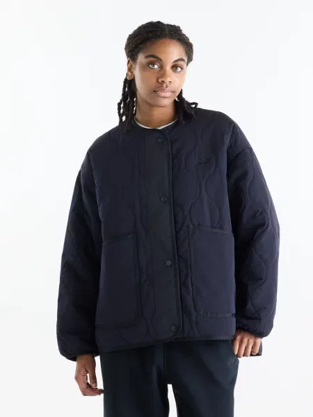 Бомбер New Balance Quilted Bomber синій