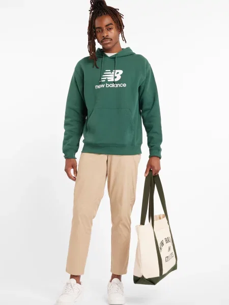Зауженные брюки New Balance бежевые