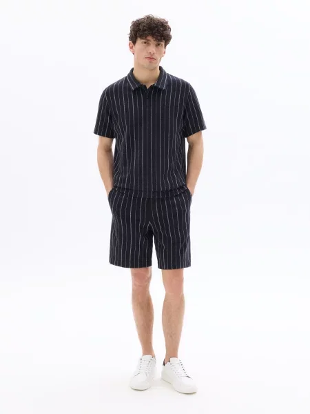 Tricou polo Celio cu dungi