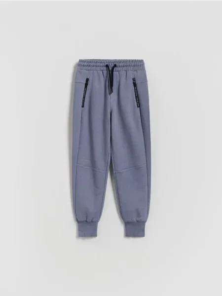 Reserved Pantaloni jogger din albastru-violet albastru