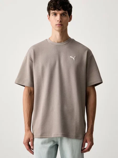 Puma tričko s bavlnou Essentials Elevated béžové