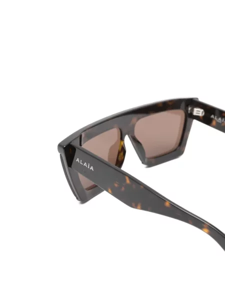 Saulės akiniai Alaia Eyewear ruda