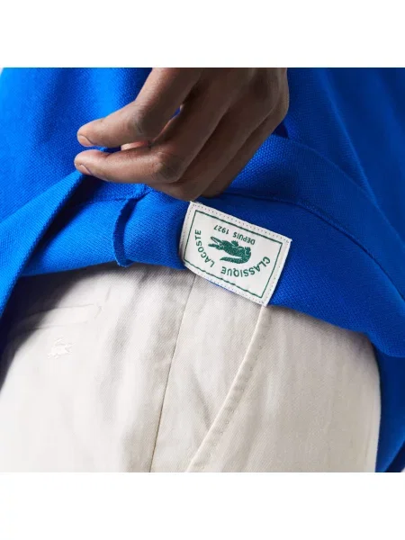 Поло Lacoste голубое