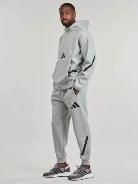 Tepláky Adidas sivá