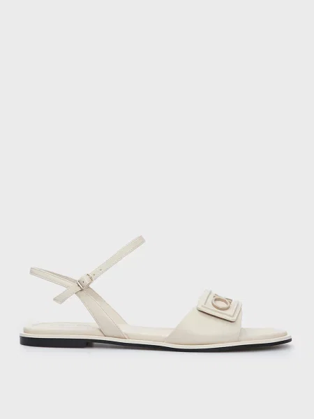 Кожаные босоножки Calvin Klein без каблука бежевые