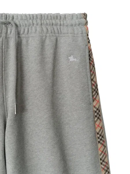 Pantaloni Burberry în carouri gri