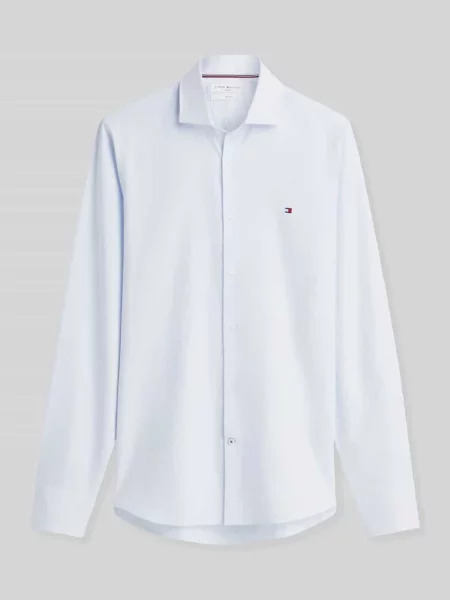 Koszula biznesowa o kroju regular fit z zaokrąglonym dołem Tommy Hilfiger niebieska