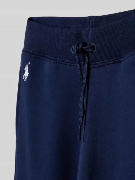 Spodnie dresowe o kroju regular fit z mieszanki bawełny Polo Ralph Lauren Teens granatowe