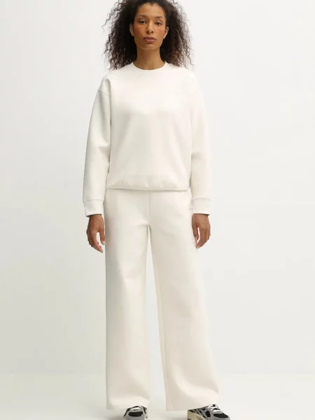 Однотонные спортивные штаны Guess бежевые