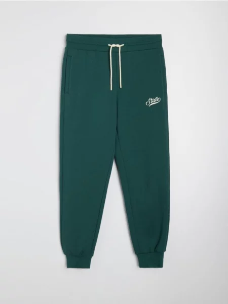 Sinsay Kalhoty Jogger slim fit zelená