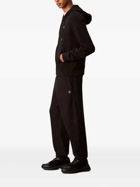 Pantaloni Calvin Klein Jeans alergare cu autograf negru