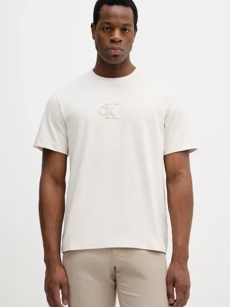 Тениска Calvin Klein Jeans с апликация бежово