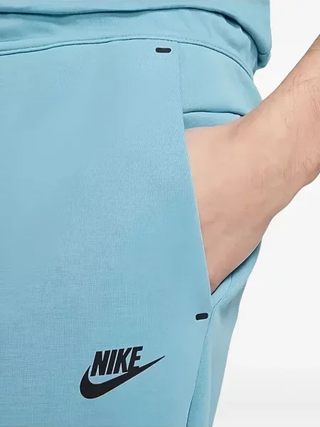 Pantaloni Nike din fleece alergare cu broderie negru