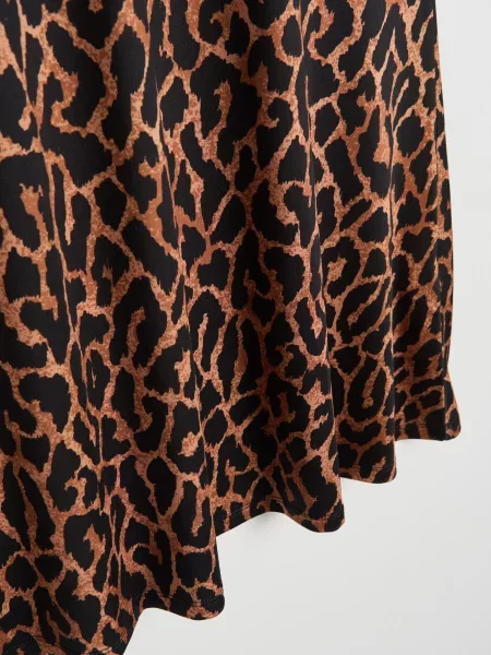 Міді спідниця з розширеним подолом в леопардовий принт коричневий