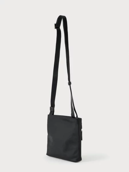 Calvin Klein Ľadvinka Sleek Slim Flatpack čierna