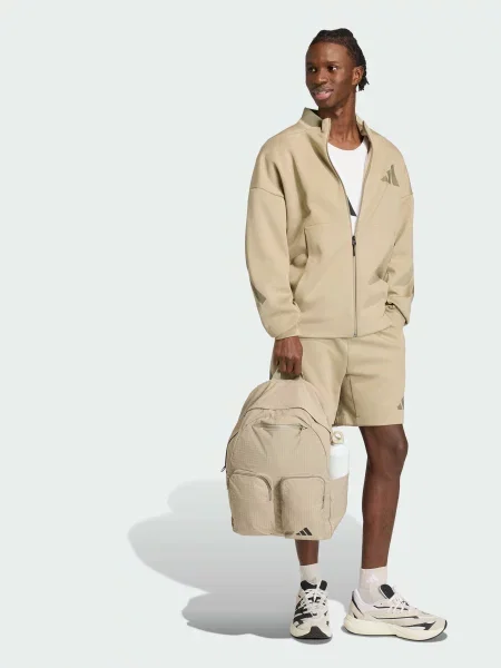 Повсякденні шорти adidas ZNE коричневий