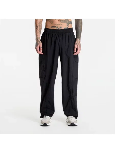 Kalhoty Under Armour Unstoppable Woven Pant Solid Black XL černé