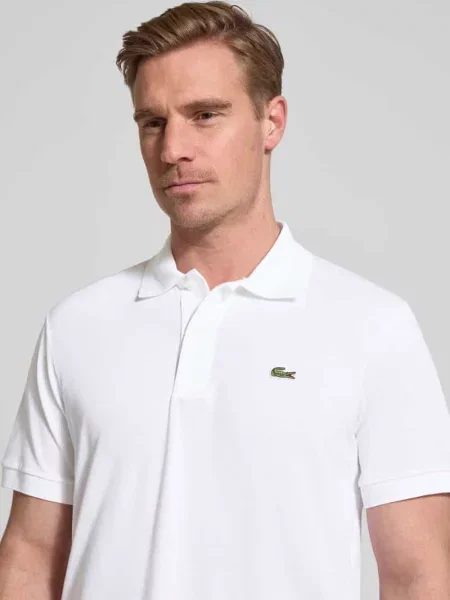 Koszulka polo o kroju regular fit z mieszanki bawełny Lacoste biała