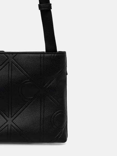 Calvin Klein Saszetka Emblem Emboss Slim Flatpack czarny