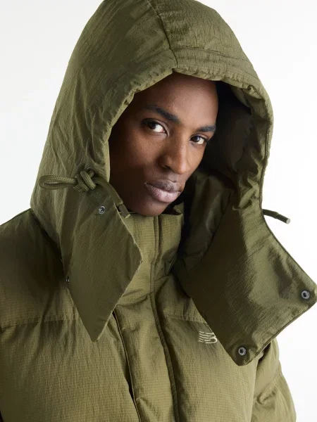 Пуховик New Balance зелений