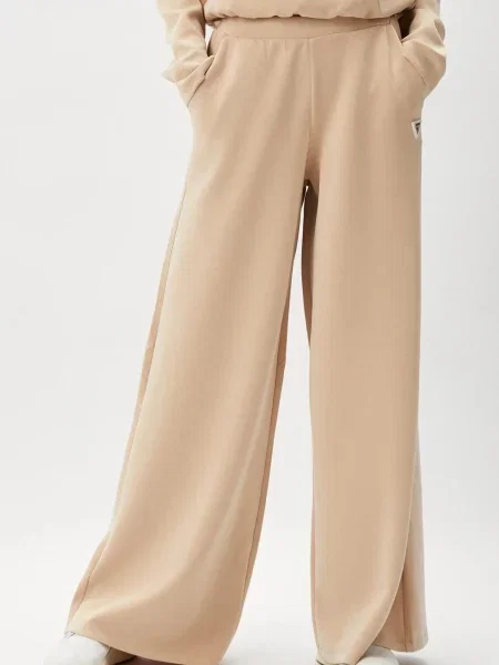 Спортивні штани GUESS бежевий