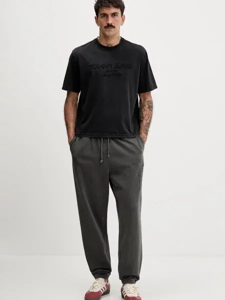 Tommy Jeans Bombažen spodnji del trenirke siva