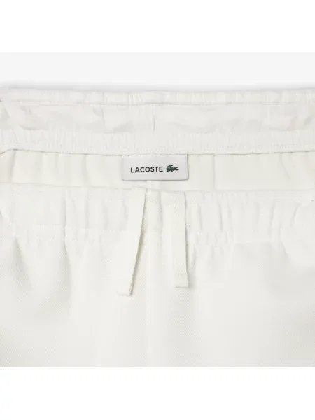 Lacoste Spodnie Dresowe Z Piki Kremowe białe