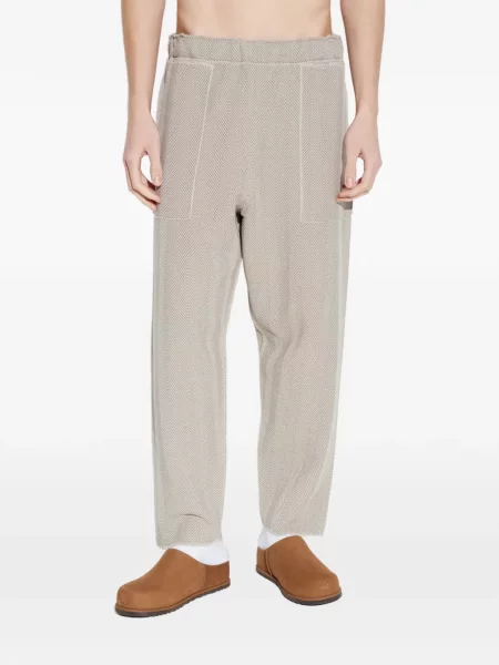 Kalhoty Homme Plissé Issey Miyake se vzorem rybí kosti