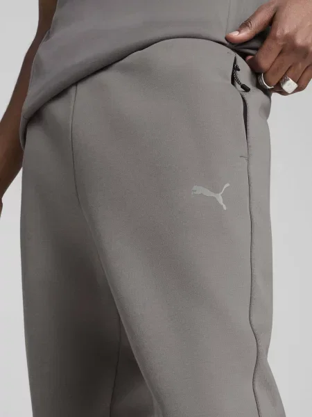 Спортивні штани PUMA EVOSTRIPE темно-сірий бавовна/поліестер сірі