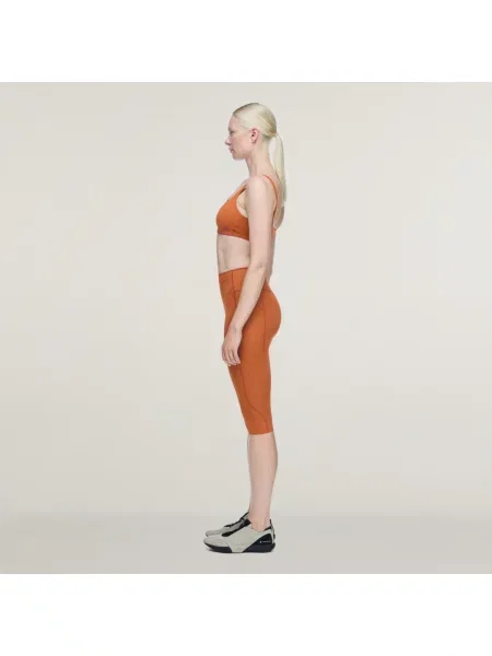 Podprsenka s mírným zpevněním adidas x entire studios Optime Training červená