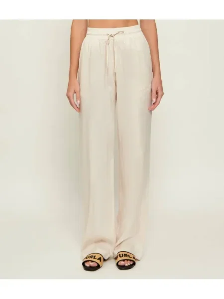 Gaëlle Paris De in pantaloni bej