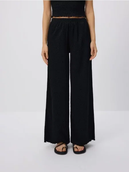 Reserved Брюки в горошек чорний