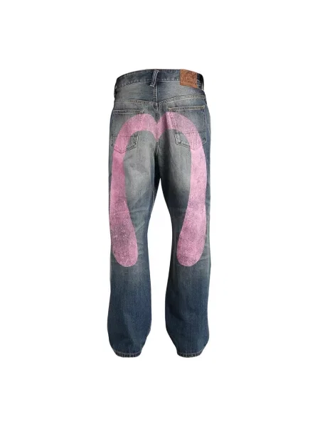 Jeansy Evisu z dziurami niebieskie