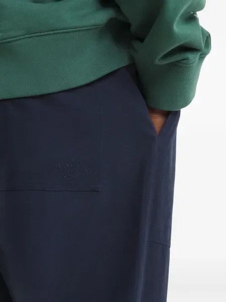 Běžecké kalhoty Maison Kitsuné se stahovací šňůrkou modré