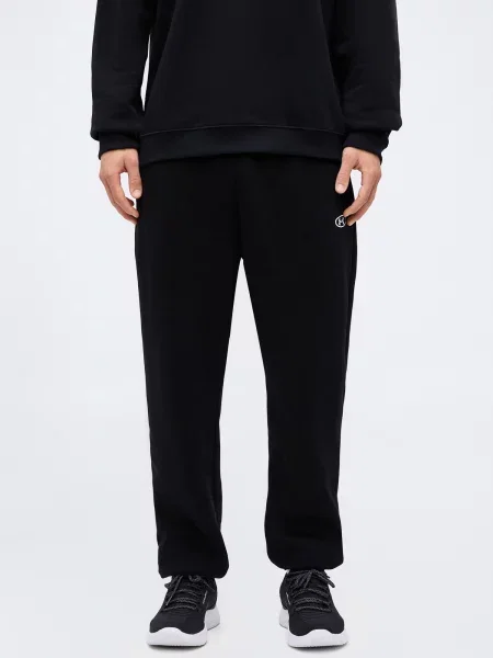 UNDER ARMOUR Športové nohavice Rival' čierna